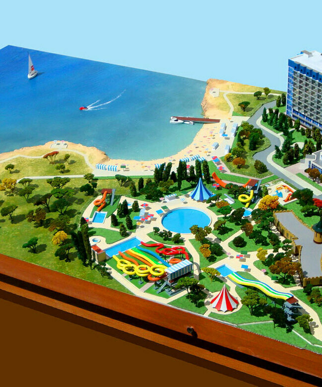 Модель курортного комплекса со своим бассейном и местом для отдыха
