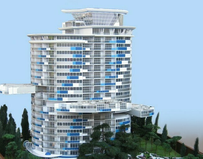 Модель здания со своей прилегающий территорией