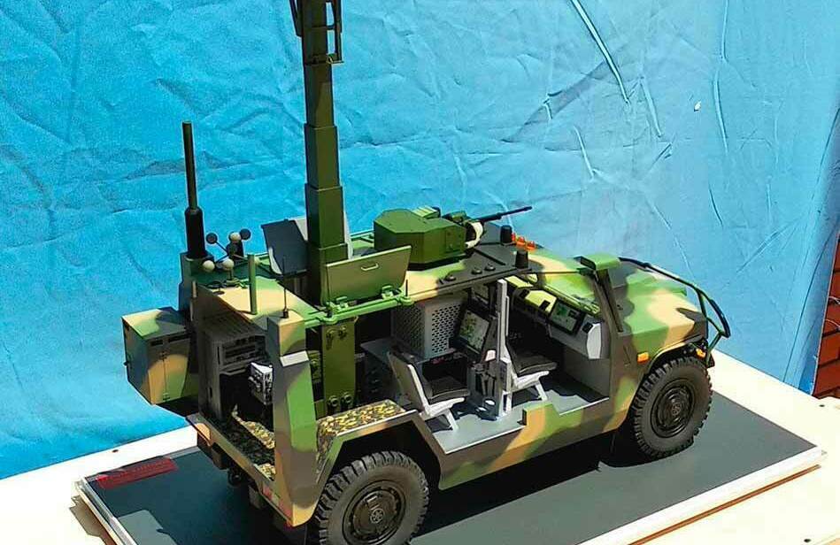 Масштабная 3-Д модель военной автомобильной техники служебно-боевой разведывательной машины (СБРМ) на базе бронеавтомобиля «Тигр-М» — детализированная реплика с выдвижной мачтой, оптико-электронными системами и камуфляжной окраской для коллекционеров и энтузиастов военной техники, изготовленная на заказ в макетной мастерской Maket-modeli.ru Реалистичная модель СБРМ (служебно-боевой разведывательной машины) на базе «Тигр-М» в масштабе: камуфляжная окраска, выдвижная разведывательная мачта с оптико-электронным оборудованием, антенны связи, пулемётная установка. Проработаны детали кабины, элементы ходовой части и спецоборудования. Воплощение современных технологий военной разведки — идеальный экспонат для коллекций, посвящённых армейской технике.