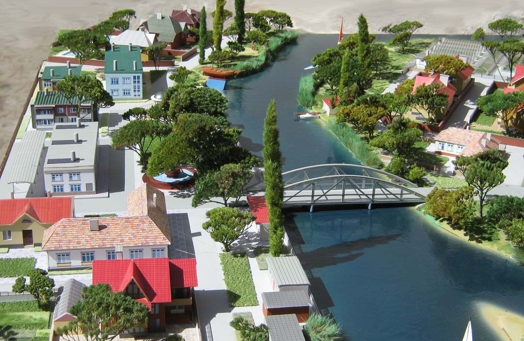 Модель микрорайона с речкой, мостом , жилыми кварталами и зоной отдыха