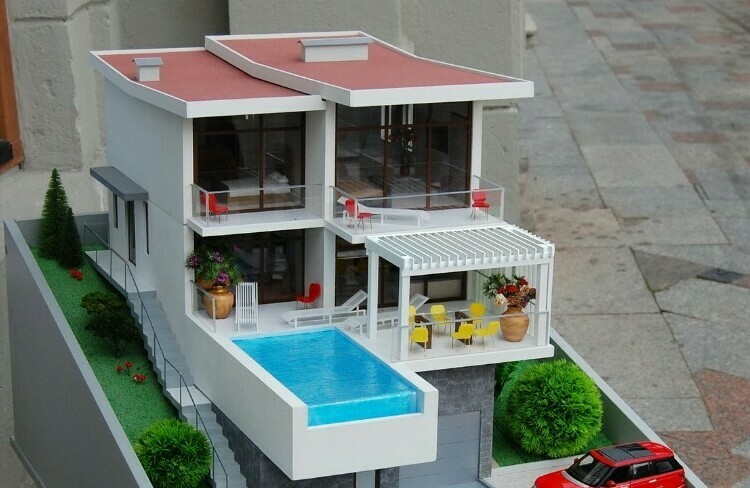 Модель коттеджа со своей парковкой и бассейном